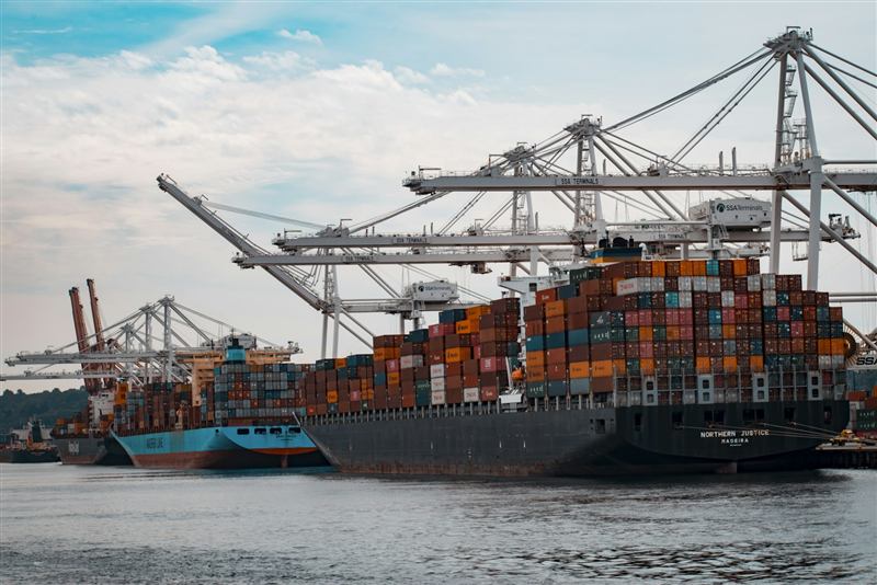 Container ship carrying international commercial cargo
